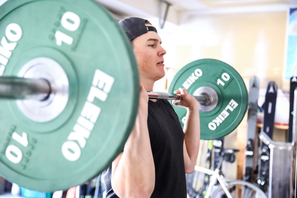 Alpine Canada athlete Jeff Read lifts weights at home in the garage on Thursday (April 15) due to COVID-19 restrictions on gyms. EVAN BUHLER RMO PHOTO