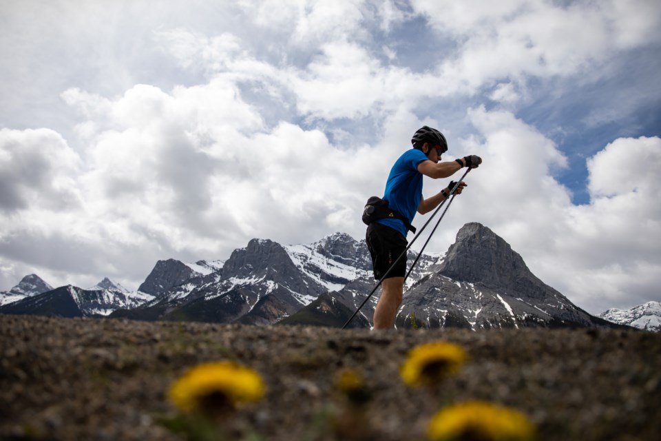 A roller skier makes his way along Highway 742 towards the Canmore Nordic Centre in Canmore on Friday (May 28). EVAN BUHLER RMO PHOTO