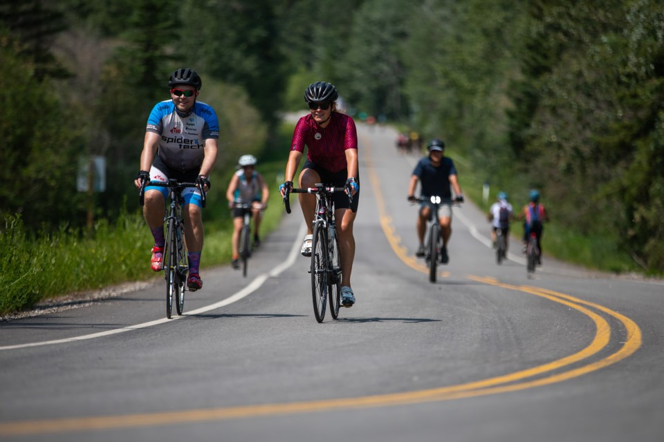 Cyclists ride along the bow Valley Parkway in Banff National Park on Saturday (July 3). EVAN BUHLER RMO PHOTO