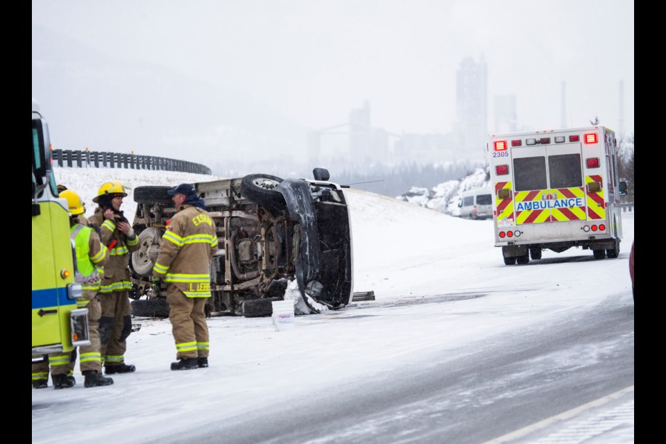 A CP Rail van lies on its side after crashing into the guard rails at the Lac des Arcs rock cut westbound on the Trans Canada Highway in 2018. RMO FILE PHOTO