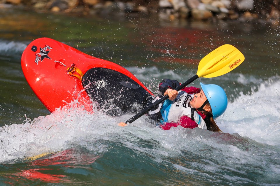 Emma Aasman, competing in the junior division, performs a spin move during the freestyle event at the Alberta Whitewater Association provincial championships in Kananaskis on Saturday (Sept. 11). EVAN BUHLER RMO PHOTO