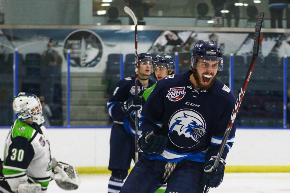 Ethan Schaeffer of the Canmore Eagles celebrates a goal at the Canmore Recreation Centre in 2021. RMO FILE PHOTO