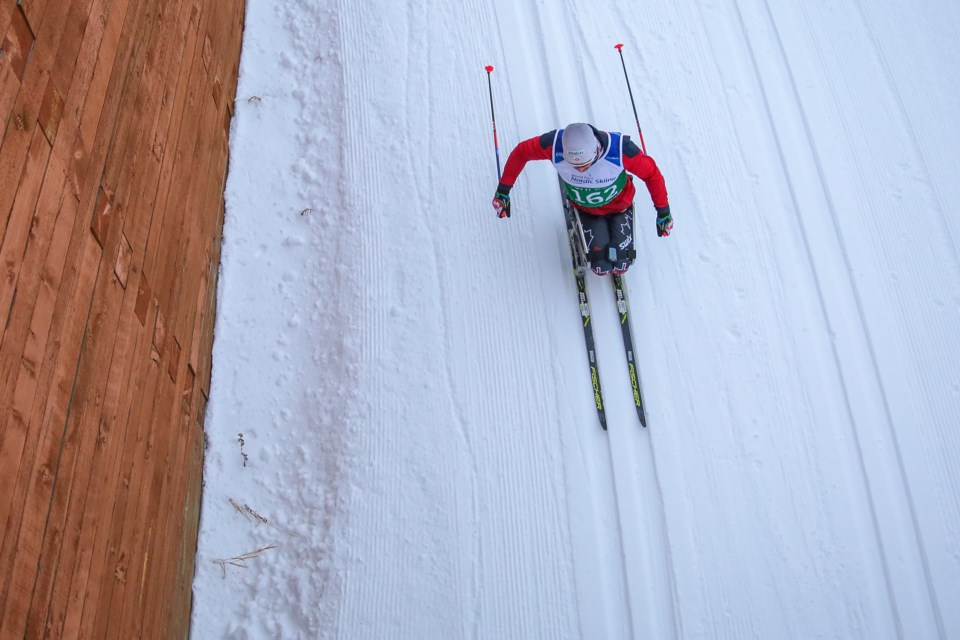 A member of Canada's Para nordic team warms up before the start of the 2021 World Para Nordic Skiing World Cup at the Canmore Nordic Centre Saturday (Dec. 4). EVAN BUHLER RMO PHOTO