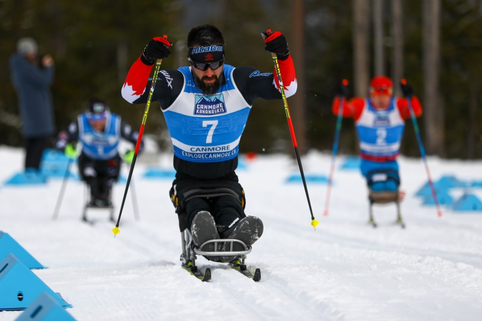 Collin Cameron of Canada skis in the men's sprint classic, sitting race final in the 2021 World Para Nordic Skiing World Cup at the Canmore Nordic Centre in Dec. 2021. RMO FILE PHOTO