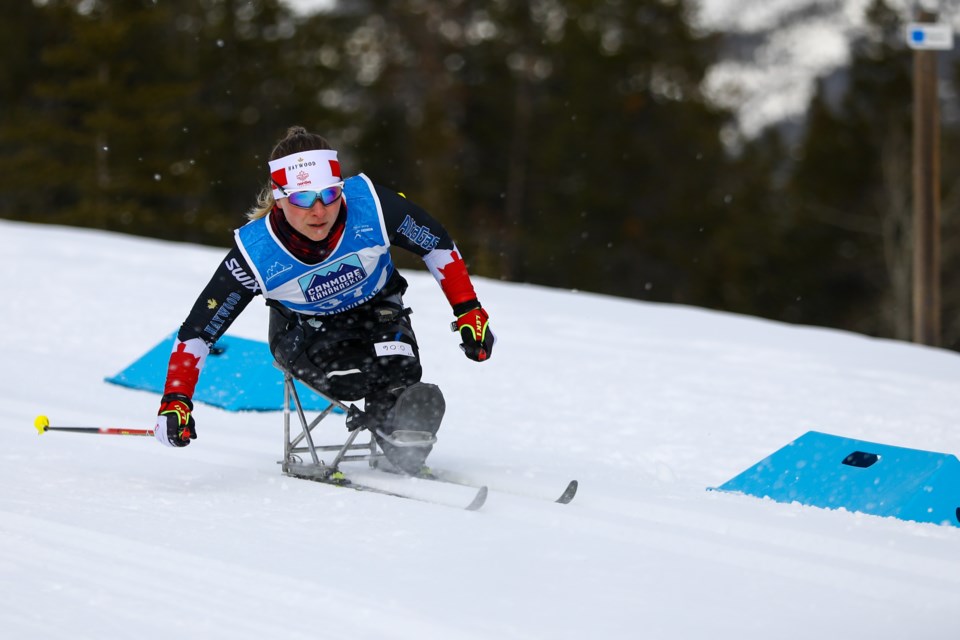 Christina Picton of Canada skis in the the women's sprint classic, sitting race final in the 2021 World Para Nordic Skiing World Cup at the Canmore Nordic Centre on Tuesday (Dec. 7). EVAN BUHLER RMO PHOTO