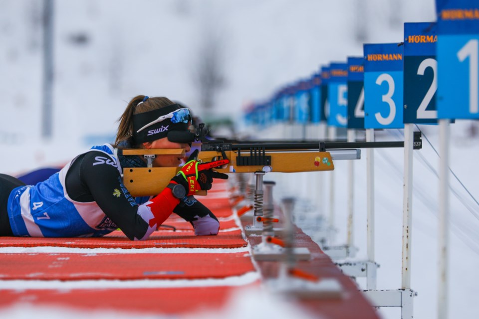 Brittany Hudak of Canada shoots from a prone position in the women's biathlon 12.5km standing race in the 2021 World Para Nordic Skiing World Cup at the Canmore Nordic Centre on Thursday (Dec. 9). EVAN BUHLER RMO PHOTO