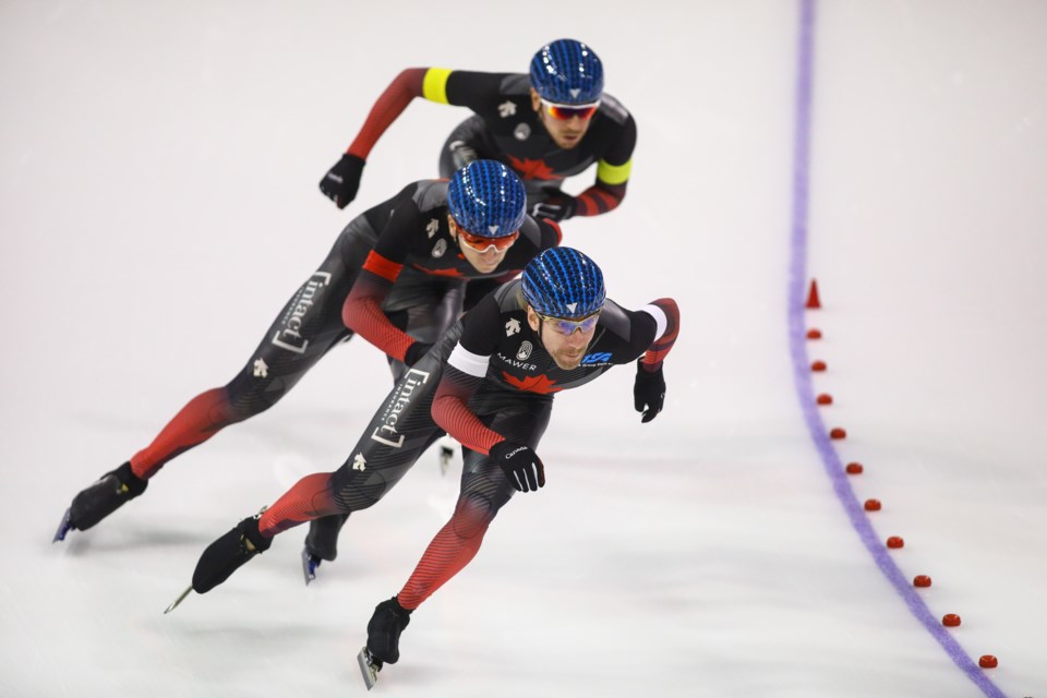 Ted-Jan Bloemen, Connor Howe and Jordan Belchos of Canada skate in the men's team pursuit race at the ISU speed skating world cup in Calgary on Sunday (Dec. 12). The trio won the bronze in the event. EVAN BUHLER RMO PHOTO