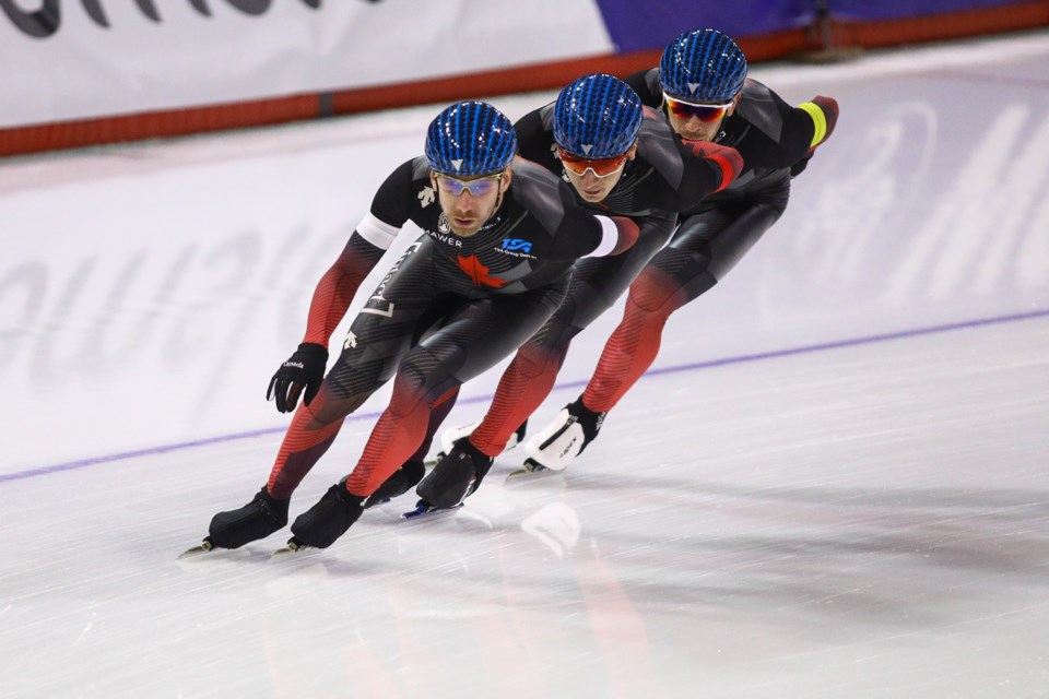 Ted-Jan Bloemen, Connor Howe and Jordan Belchos of Canada skate in the men's team pursuit race at the ISU speed skating world cup in Calgary on Sunday (Dec. 12). The trio won the bronze in the event. EVAN BUHLER RMO PHOTO