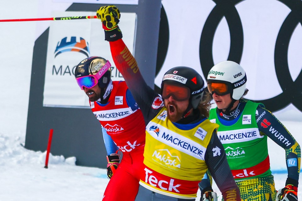 Canmore's Kris Mahler celebrates as he crosses the finish line winning the gold medal during the men's world cup ski cross event at Nakiska Ski Resort on Saturday (Jan. 15). EVAN BUHLER RMO PHOTO