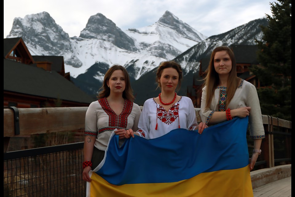 Long-time Canmore residents Ania Vozna, Maria Nazarenko and Liza Kanishcheva hope to raise awareness for Ukraine after Russia invaded their home country in February. GREG COLGAN RMO PHOTO
