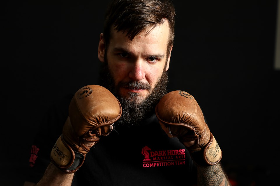 Mixed martial artist Travis Erlam poses at Dark Horse Martial Arts in Canmore in April 2022.
JUNGMIN HAM RMO PHOTO