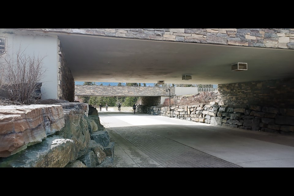 People use the pedestrian underpass connecting Bow Valley Trail and Cougar Creek on Monday (May 2).

GREG COLGAN RMO PHOTO