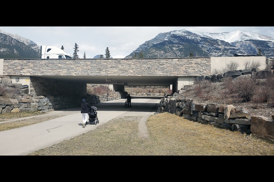 People use the pedestrian underpass connecting Bow Valley Trail and Cougar Creek on Monday (May 2).

GREG COLGAN RMO PHOTO