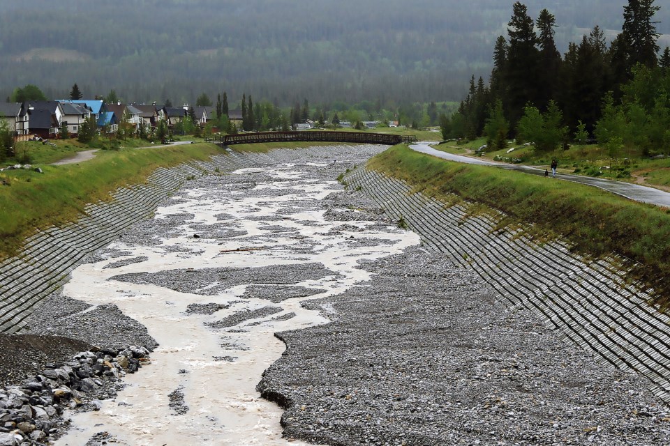 Water makes its way down Cougar Creek on Monday (June 13) with Environment Canada estimating 75-125 millimetres of rain coming down in the Bow Valley until Wednesday (June 15).

GREG COLGAN RMO PHOTO