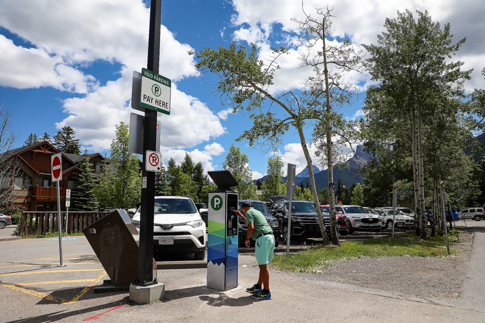 20220705 Paying for parking in downtown Canmore JH 0001