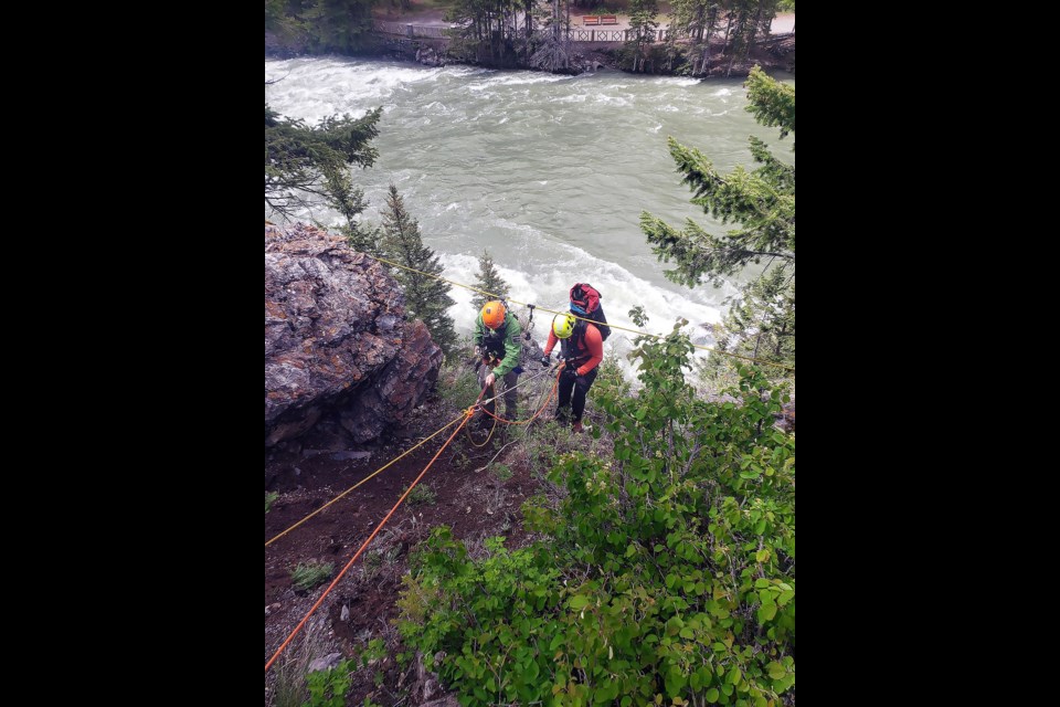 Parks Canada saved a baby elk stranded on a narrow ledge above the treacherous Bow Falls in a dramatic cliffside rescue on June 18.

PHOTO COURTESY OF PARKS CANADA