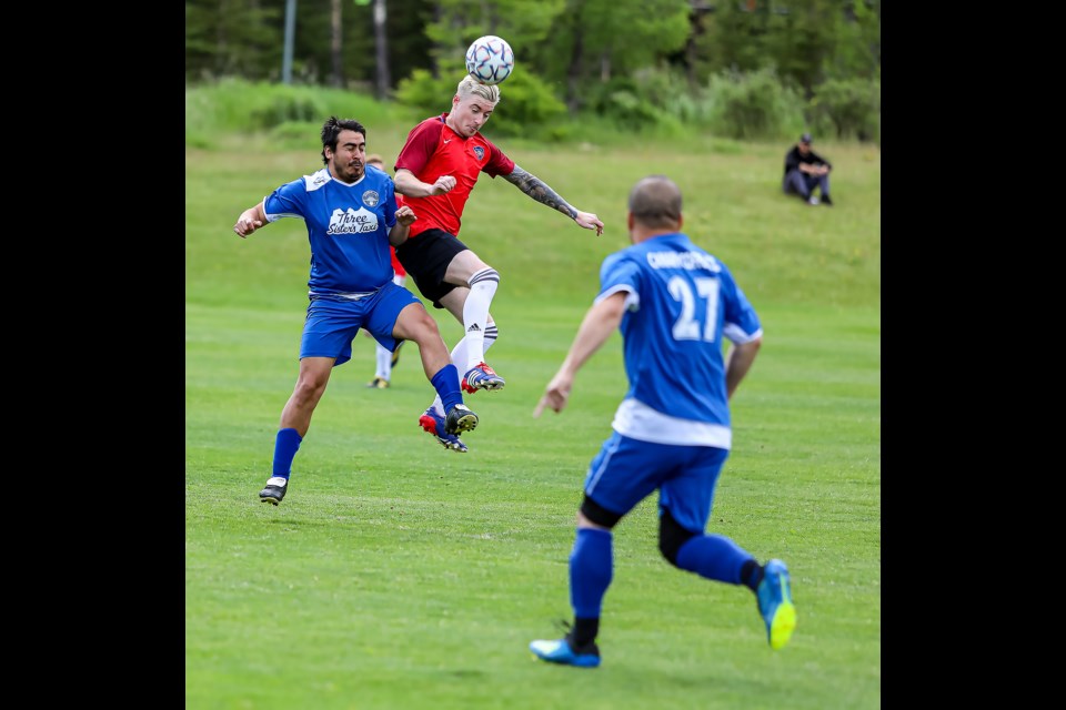 Marceho Calderon, left, of Rundle FC and Mikey Monaghan of the Banff Pump and Tap soccer team jump for a header during a match in the Bow Valley Soccer League at Our Lady of the Snows Catholic Academy Field in Canmore on Sunday (July 10). Banff Pump and Tap defeated Canmore Rundle 6-3. JUNGMIN HAM RMO PHOTO