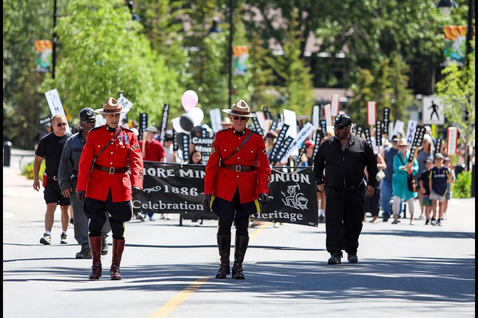 Miner's families head down Main Street for the Canmore Miner's Day parade on Saturday (July 16). JUNGMIN HAM RMO PHOTO