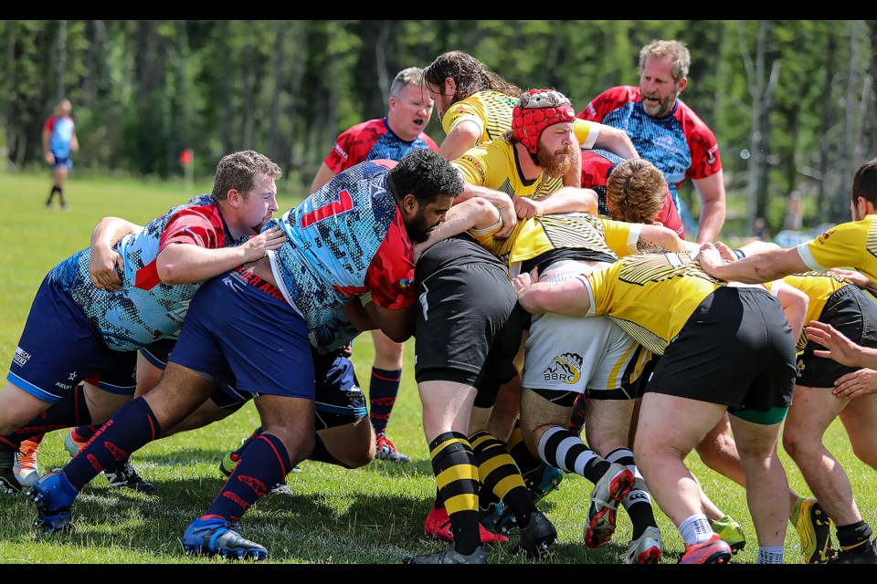 The Banff Rugby Club Bears get into a scrum against the Calgary Canucks Rugby Club at the Banff Recreation Grounds on Saturday (July 23). The Banff Bears defeated the Calgary Canucks, 60-17. JUNGMIN HAM RMO PHOTO