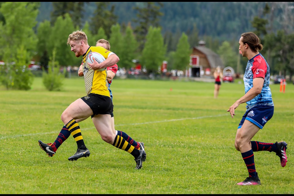 Bears Carter White makes a try during the second half against the Calgary Canucks Rugby Club at the Banff recreation grounds on Saturday (July 23). The Banff Bears defeated the Calgary Canucks, 60-17. JUNGMIN HAM RMO PHOTO