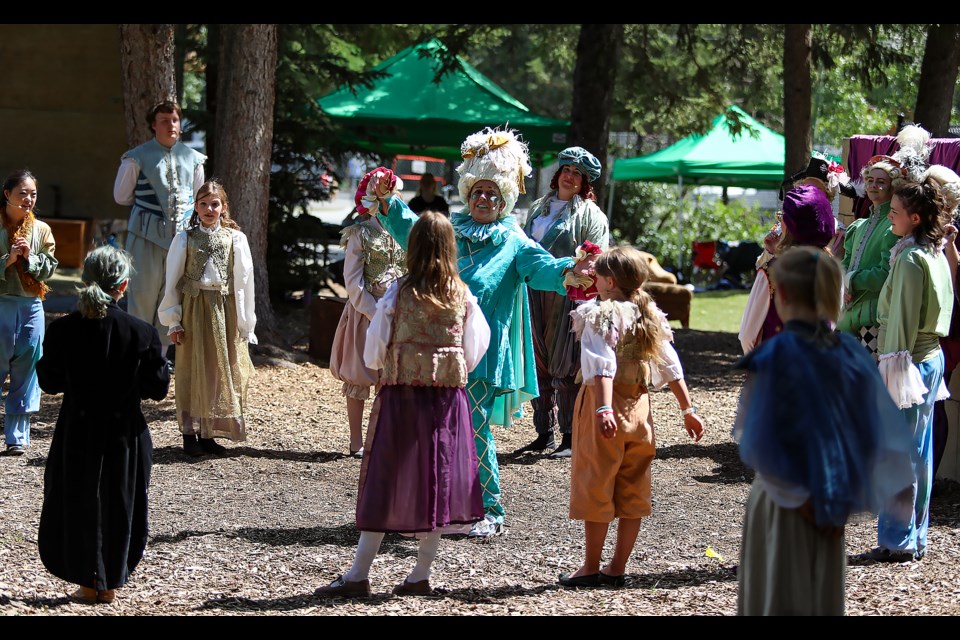 Sherry Thompson, centre, performs in The Emperor's New Clothes during the Pine Tree Players summer theatre festival at the Stan Rogers Memorial Stage in Millenium Park in Canmore on Sunday (July 24). JUNGMIN HAM RMO PHOTO