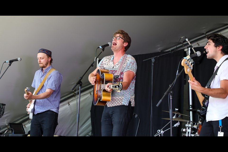 Sam Polley, centre, and the Old Tomorrows played the 45th annual Canmore Folk Festival at Centennial Park in Canmore on Sunday (July 31). JUNGMIN HAM RMO PHOTO