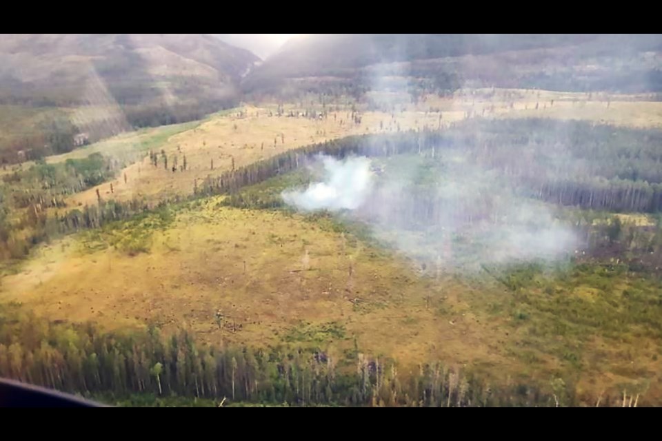 A 0.2-hectare wildlife two kilometres west of Banff National Park's east gate is under control by Parks Canada fire personnel, the federal agency announced Saturday morning.

PHOTO COURTESY OF PARKS CANADA