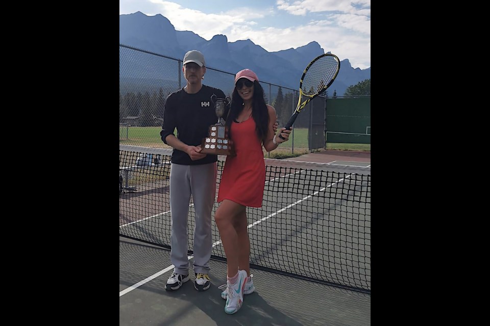 The Canmore Tennis Association Club championships were held Aug. 13 with the final matches resulting in awards. Marie Yvon won the ladies' singles and Adrien Chartier claim the men's singles top prize, with Hisae Maruyama and Leslie Marcello winning ladies' doubles and Brian and Colin McKinlay winning men's doubles. Ricarda Peter and Manuel Schneider (seen here) won mixed doubles.

SUBMITTED PHOTO
