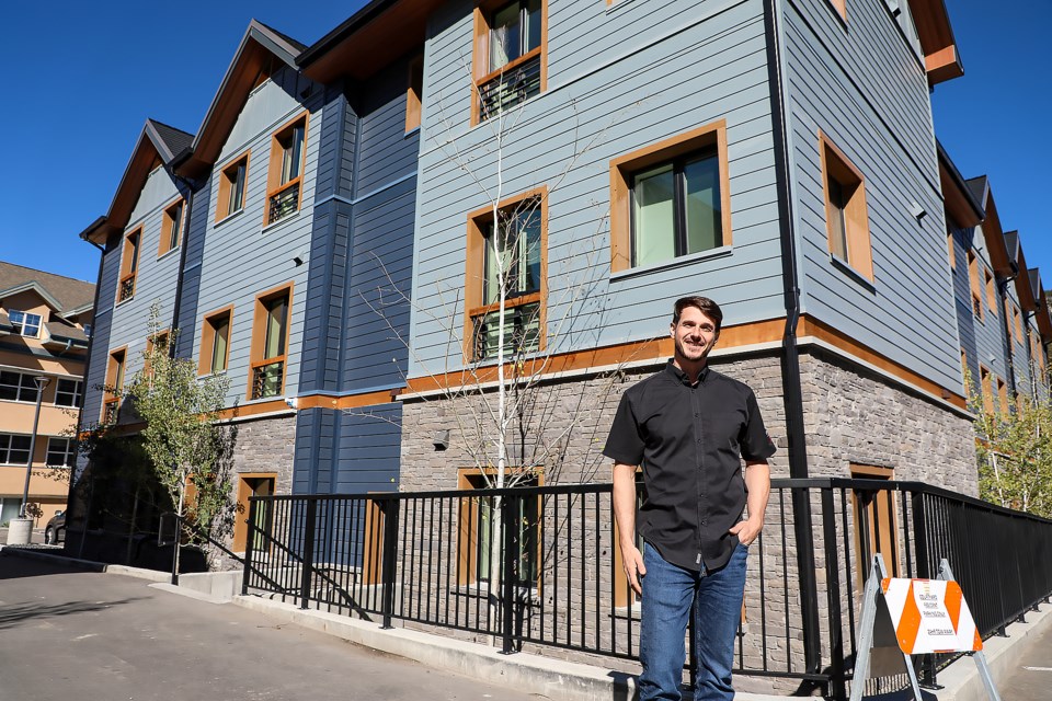 Social enterprise manager Neil Atkinson poses in front of a new affordable housing at Banff YWCA on Tuesday (Sept.20). JUNGMIN HAM RMO PHOTO