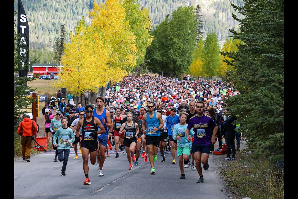 Participants in the five kilometre and 10 km distances race out of the start gate at the annual Melissa's Road Race in Banff on Saturday (Sept. 24). JUNGMIN HAM RMO PHOTO