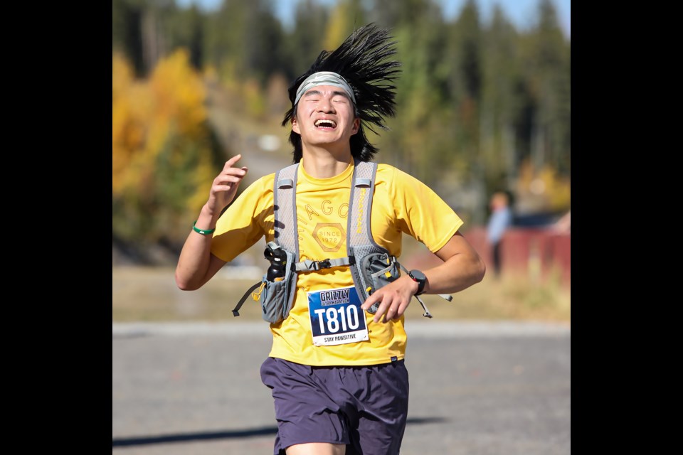 Evan Wong of the Edmonton's Speedy E's (No. 810) finishes second in the 50-kilometre five-person team race on Saturday (Oct. 8) at the 2022 Grizzly Ultra Marathon at the Canmore Nordic Centre. JUNGMIN HAM RMO PHOTO