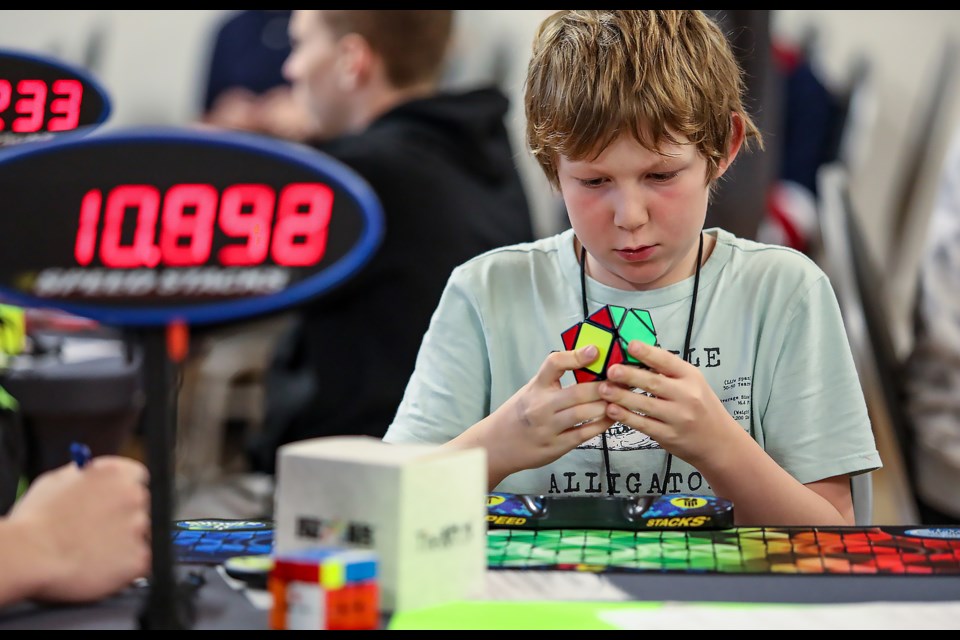 Banff's Daniel Eaton competes in the skewb challenge at the Rockies Rager Fall 2022. It was Canmore's first ever official Rubik's Cube speedsolving competition at the Canmore Recreation Centre on Saturday (Oct. 8). JUNGMIN HAM RMO PHOTO