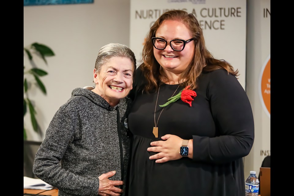 Canadian Rockies Public Schools trustee Carol Picard was presented the Queen's Platinum Jubilee Medal by NDP MLA Sarah Hoffman at the monthly school board meeting in Canmore on Wednesday (Oct. 19). JUNGMIN HAM RMO PHOTO 