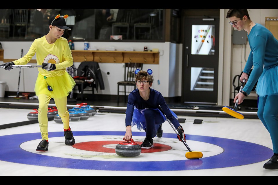 Team Duncan competes in Halloween costumes during the 8th annual youth Halloween Bonspiel U18 at the Canmore Golf and Curling Club on Saturday (Oct. 29). JUNGMIN HAM RMO PHOTO