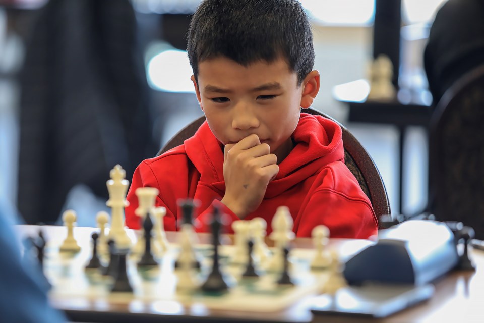 Ryan Li plays chess in the 2022 Banff Open tournament held at the Banff Centre on Friday (Nov.11). JUNGMIN HAM RMO PHOTO 