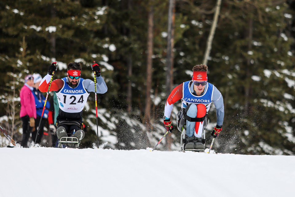 Derek Zaplotinsky, right, and Collin Cameron race in the 2022 Nordiq Canada Para Nordic Time Trials at the Canmore Nordic Centre on Tuesday (Nov. 22). JUNGMIN HAM RMO PHOTO