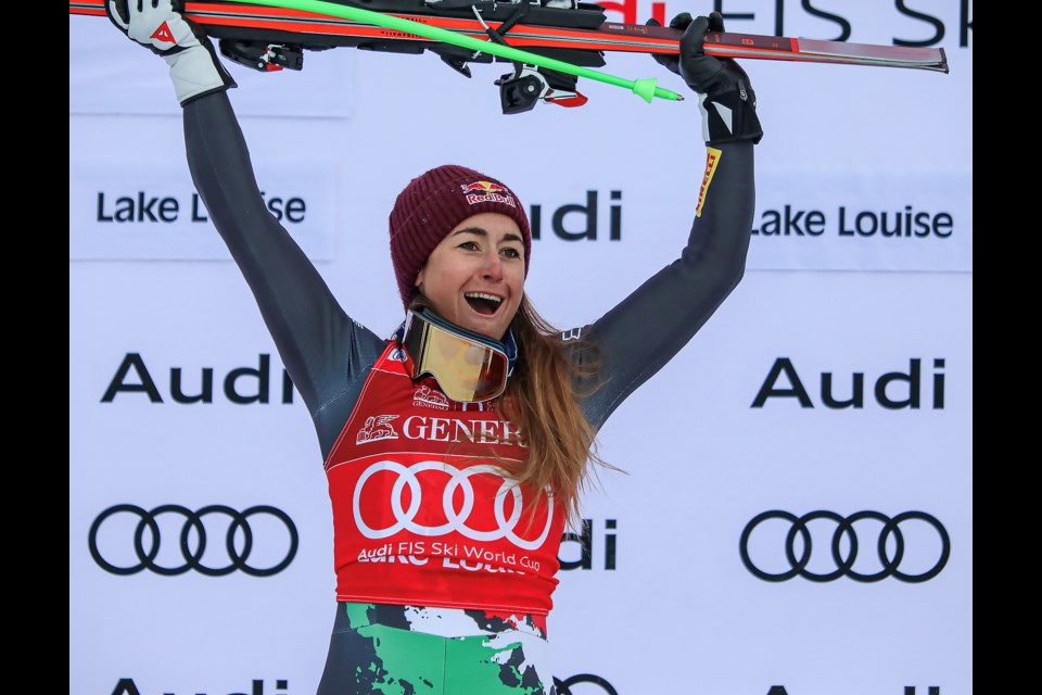 Italy's Sofia Goggia celebrates her gold medal on the podium during the women's FIS downhill at the 2022 Lake Louise Alpine World Cup on Friday (Dec. 2). JUNGMIN HAM RMO PHOTO