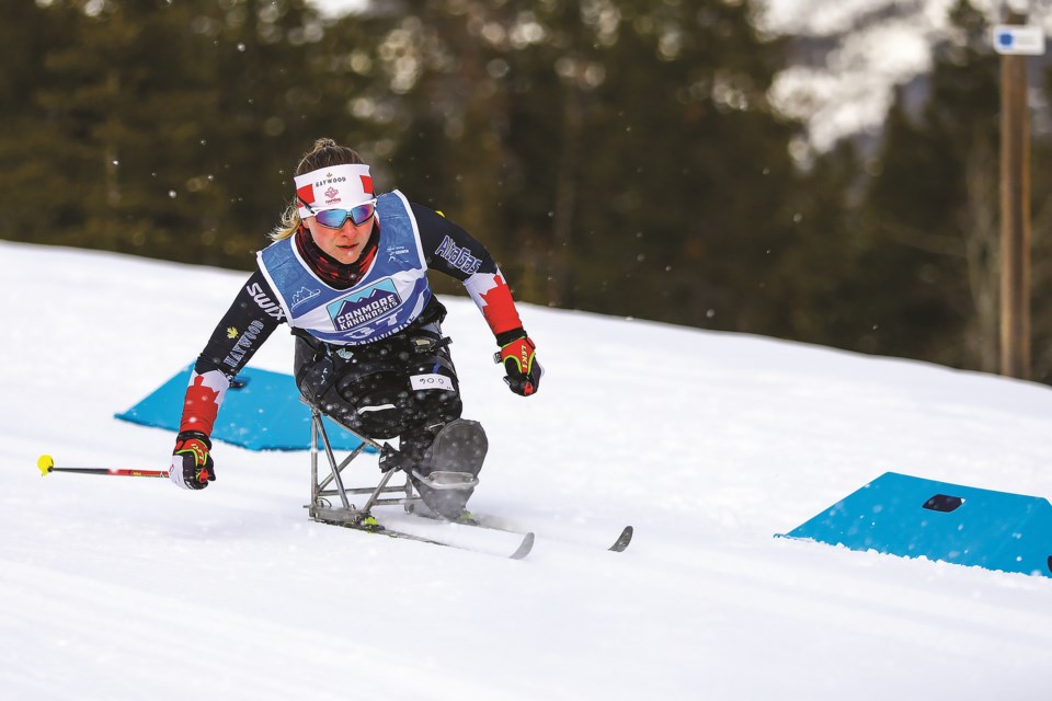 Christina Picton of Canada skis in the women's sprint classic, sitting race final in the 2021 World Para Nordic Skiing World Cup at the Canmore Nordic Centreon Tuesday (Dec. 7). EVAN BUHLER RMO PHOTO