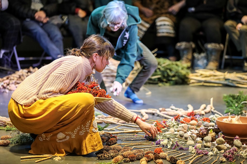 Artist Laurelle Birk creates a mandala at the Stories of the Land Cultural Learning Circle at artsPlace in Canmore on Wednesday (Jan. 25). JUNGMIN HAM RMO PHOTO