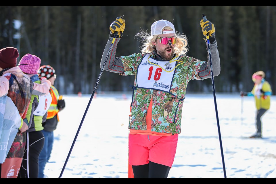 Team The Snow leopards' Chas Jones crosses the finish line at the 2023 Mountain Madness Relay Race on Friday (Feb. 3). JUNGMIN HAM RMO PHOTO