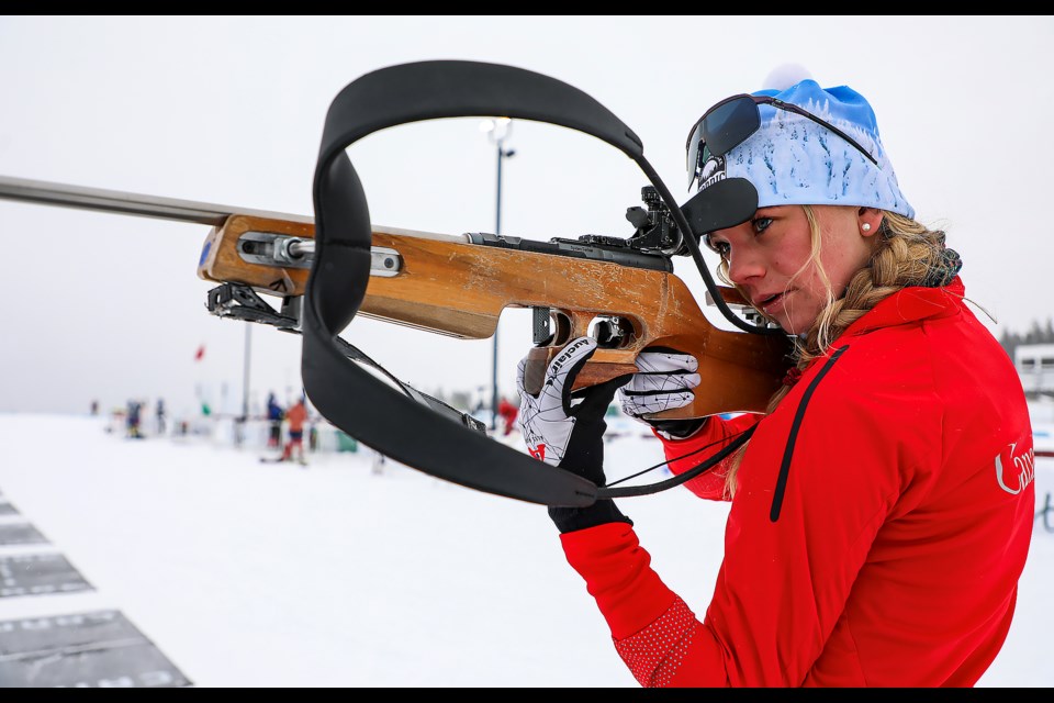 Canmore biathlete Anna Sellers poses at the Canmore Nordic centre on Tuesday (Feb. 21).  JUNGMIN HAM RMO PHOTO