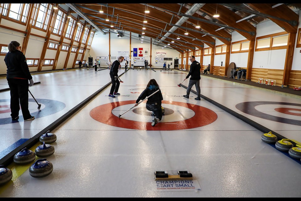 The Banff Curling Club and Okotoks Curling Club compete in the first virtual curling game ever for Curling Day in Canada Festival at the Fenlands Banff Recreation Centre on Saturday (Feb. 25). JUNGMIN HAM RMO PHOTO