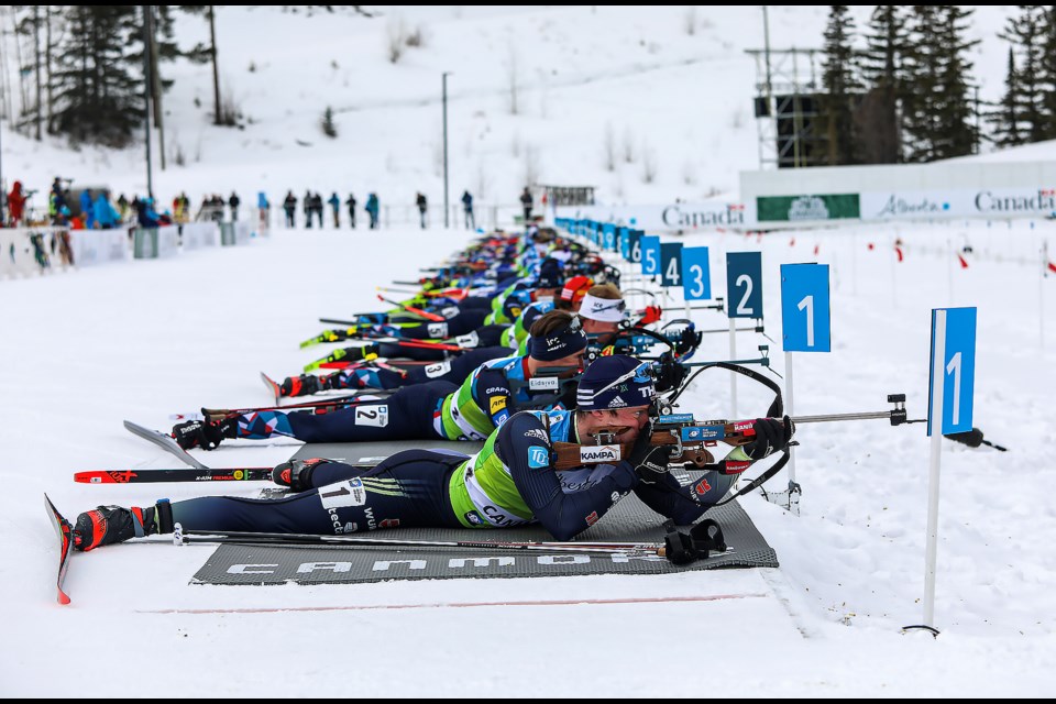 The half group's men's mass start shoots at the first prone bout during the men's 15-km mass start at the Canmore IBU Cup at the Canmore Nordic Centre  on Tuesday (Feb. 28). JUNGMIN HAM RMO PHOTO 