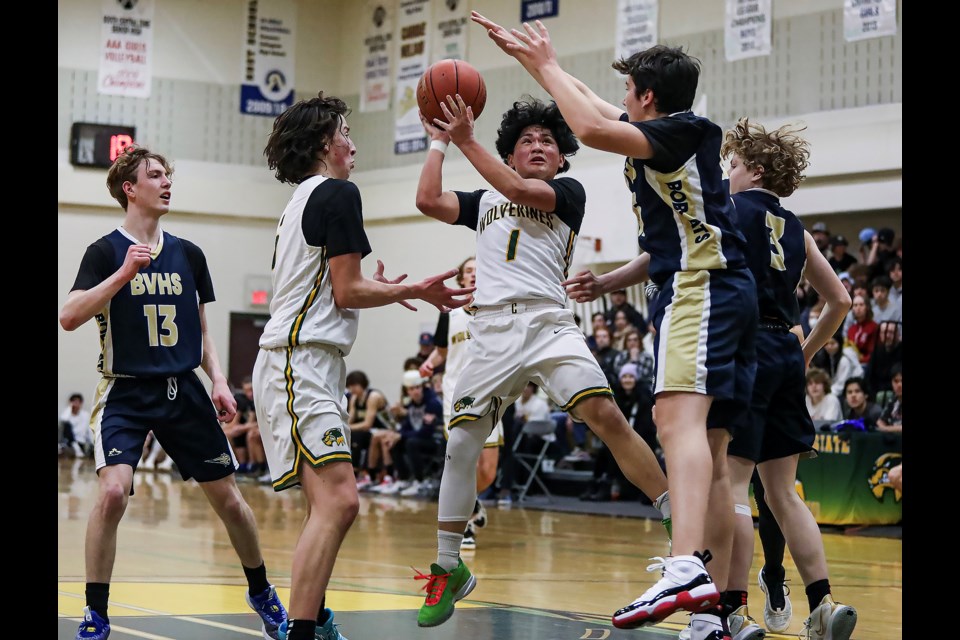Canmore Wolverines Gabriel Bongbong takes a shot against the Bow Valley High School Bobcats during the JV boys basketball zones acton at Canmore Collegiate High School on Friday (March 10). JUNGMIN HAM RMO PHOTO