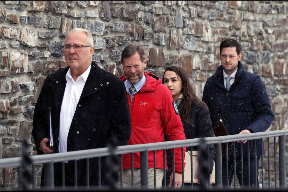 President of the King's Privy Council of Canada and the Minister of Emergency Preparedness Bill Blair, Vice President of the board for Search and Rescue Association of Alberta Doug Ritchie, Revitalization Project Leader Lexie Busby and CEO of Search and Rescue Association of Alberta John Alexander heads towards a federal funding announcement Monday (March 13) at   the Cave and Basin National Historic Site of more than $2 million for the province's search and rescue teams.

GREG COLGAN RMO PHOTO