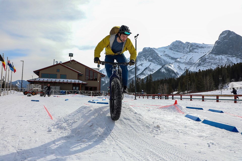 Sam Gauthier competes in the fastest fat bike obstacle course laps at the Camore and Area Mountain Bike Association's first winter fat biking festival CAMBAPALOOZA at the Canmore Nordic Centre on Saturday (March 18). JUNGMIN HAM RMO PHOTO