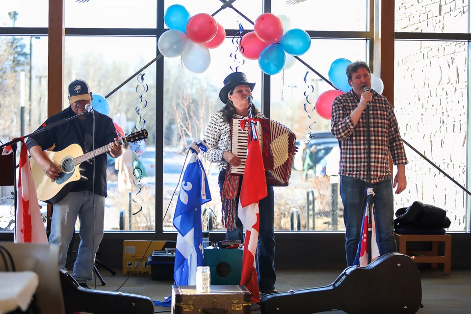 The trio Dépaysés perform in the Soirée francophone event at Canmore Public Library on Tuesday (March 21). From left: Fabian Gregory, Patricia Marois and Eric Brousseau. JUNGMIN HAM RMO PHOTO