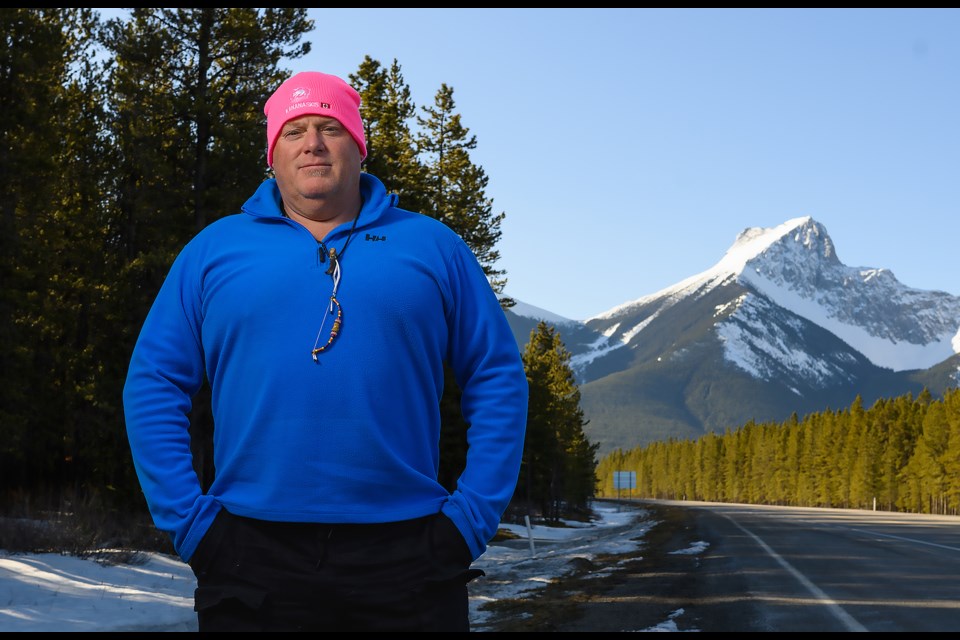 Ken Hoover poses near where an access road to a proposed glamping site would be built in Kananaskis Country off Highway 40, on Thursday, March 23, 2023. MATTHEW THOMPSON RMO PHOTO