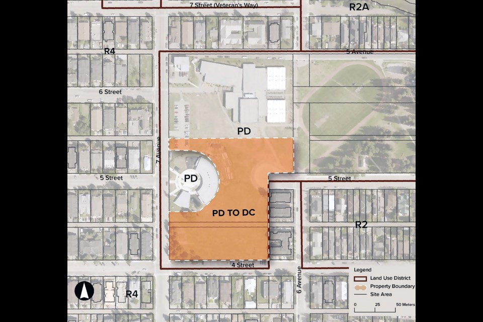 A small area of the Lawrence Grassi Middle School area redevelopment plan will head to a public hearing to decide if a portion of land that's a public use district should be modified to a direct control district.

SUBMITTED PHOTO