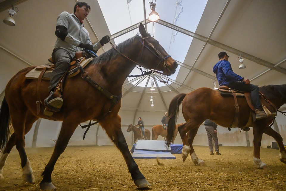 Participants of a Stunt Nations workshop makes their rounds around the arena at Chiniki Ranch in Îyârhe (Stoney) Nakoda First Nation on Tuesday (March 28). Stunt Nations is an Indigenous owned non-profit that teaches an array of stunts to aspiring and working stunt people. MATTHEW THOMPSON RMO PHOTO